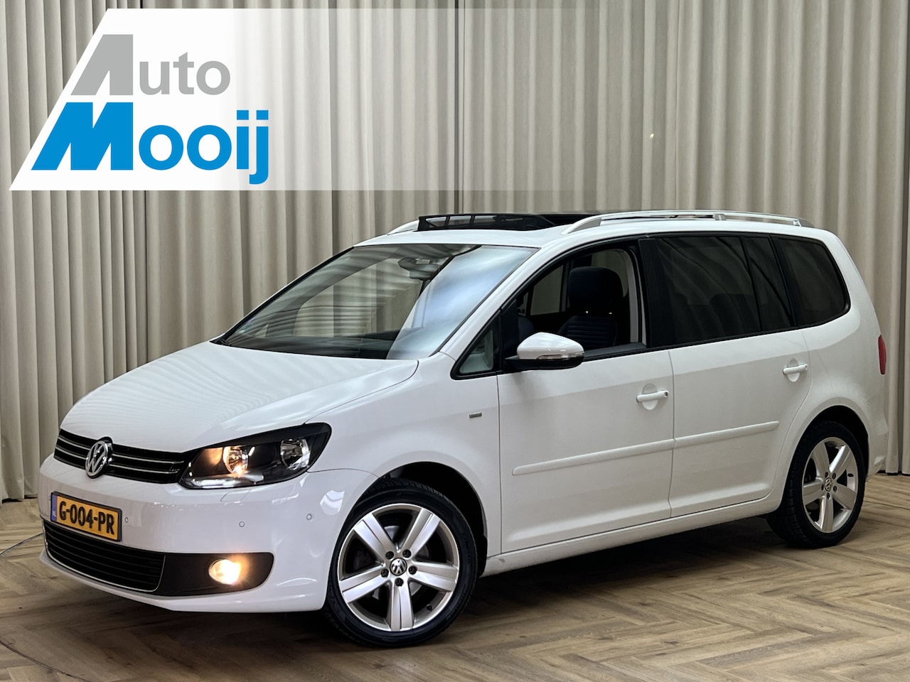 Volkswagen Touran - 1.2 TSI Comfortline Cup BlueMotion 7p. *7 persoons* Apple Carplay / Navigatie / Cruise / E - AutoWereld.nl