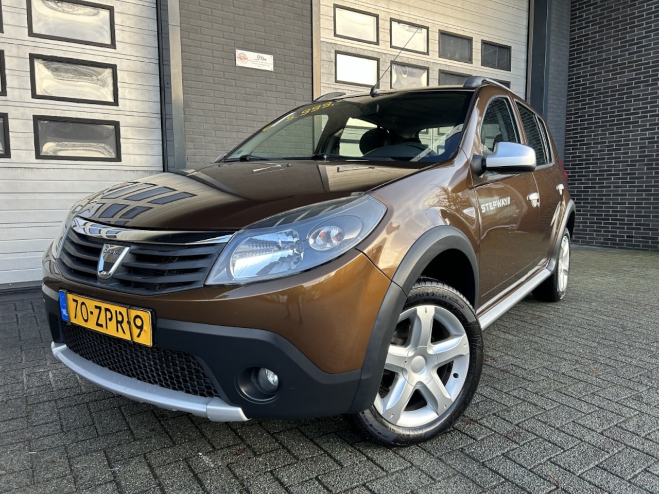 Dacia Sandero Stepway - 1.6 Bleutooth•Airco TOPSTAAT! - AutoWereld.nl