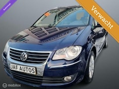 Volkswagen Touran - 1.4 TSI Highline 7pers LEER DSG NAVVI