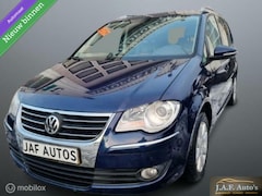 Volkswagen Touran - 1.4 TSI Highline 7pers LEER DSG NAVVI