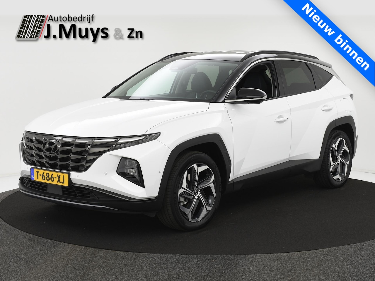 Hyundai Tucson - 1.6 T-GDI 265PK PHEV Premium 4WD TREKH|LEER|ACC|BLIS|MEMORYSTOEL|WINTERPACK|360CAMERA|NAVI - AutoWereld.nl