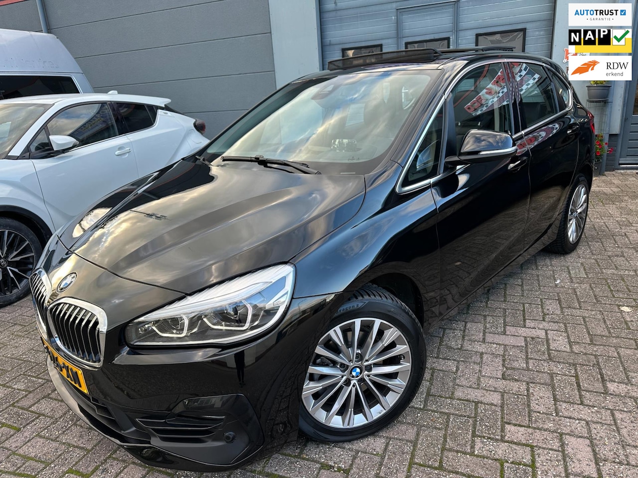 BMW 2-serie Active Tourer - 218i 2021 HIGH-EXE SPORT EDITION PLUS PANO LEER HUD - AutoWereld.nl