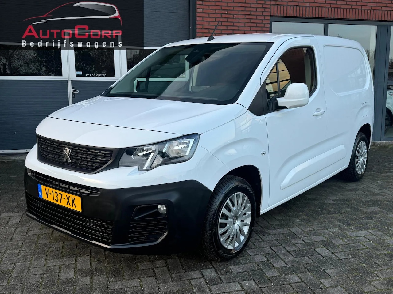 Peugeot Partner - 1.6 BlueHDI Premium Cruise Navi - AutoWereld.nl