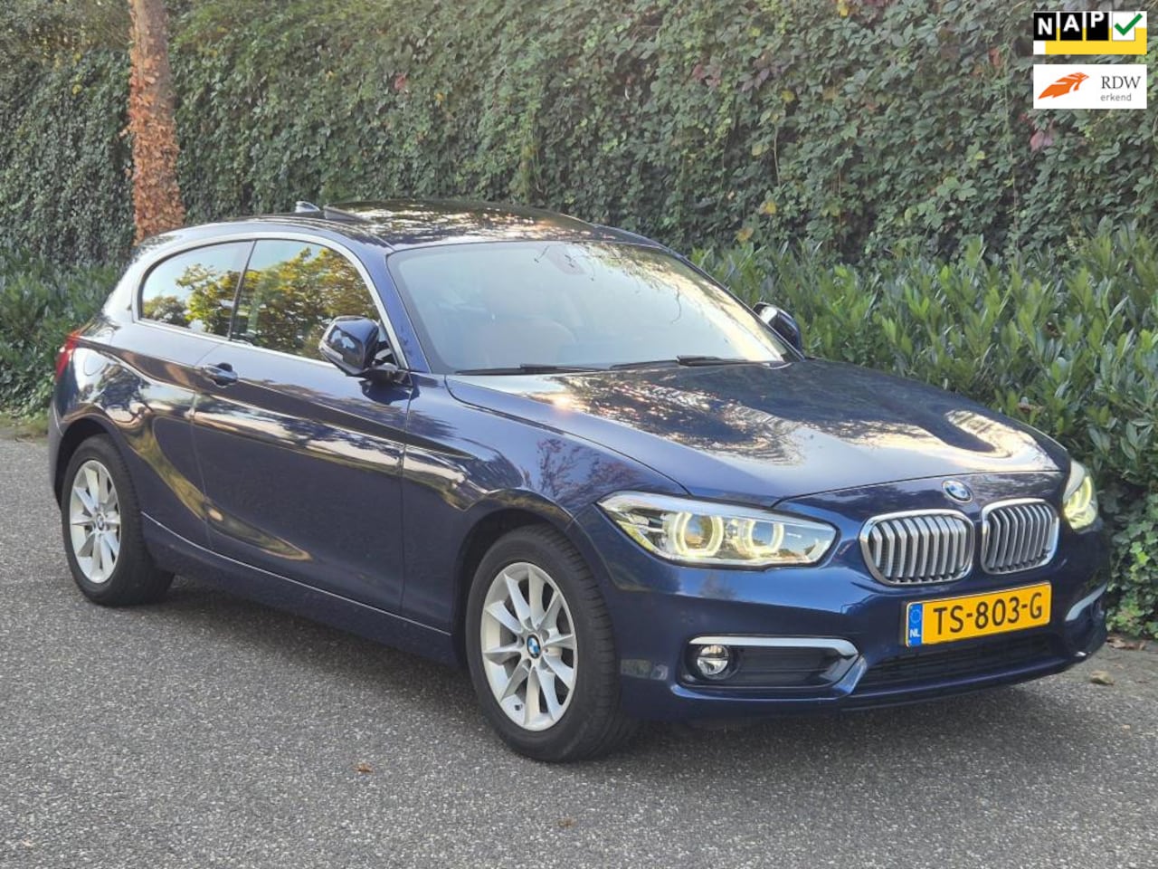 BMW 1-serie - 118i High Executive M Sport Stuur CarPlay Pano Elek. Stoelen NAP Leder F. Option - AutoWereld.nl