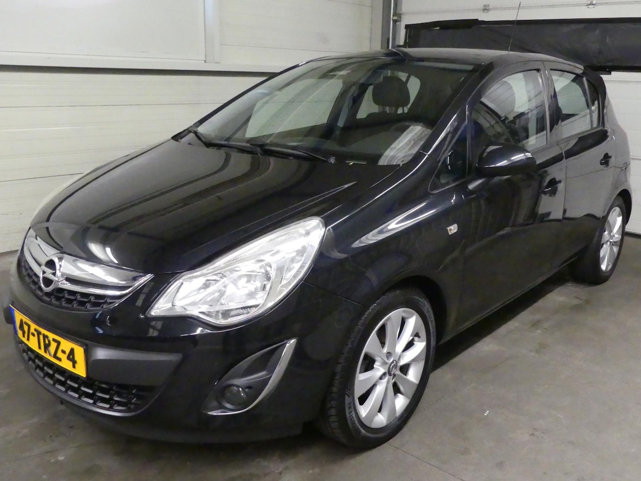 Opel Corsa - 1.4-16V Anniv Edition - Airco - Cruise Control - Half Leer - AutoWereld.nl