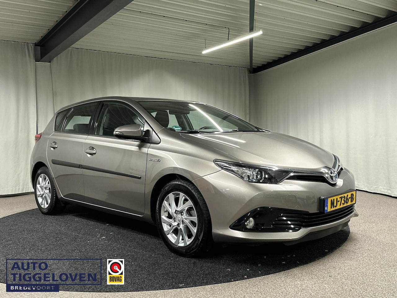 Toyota Auris - 1.8 Hybrid Dynamic 1.8 Hybrid Dynamic - AutoWereld.nl