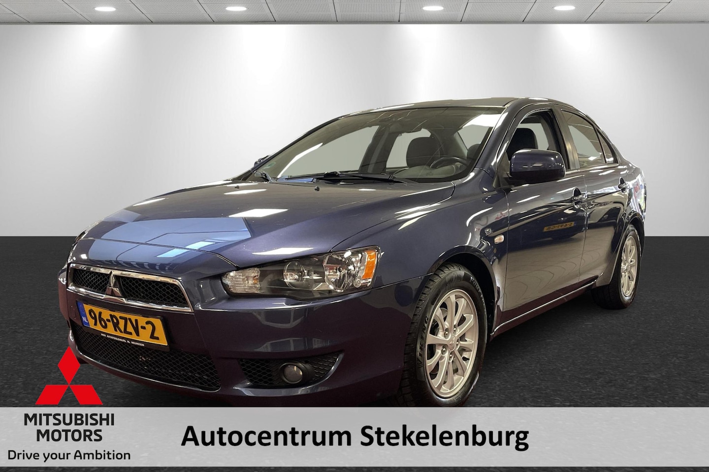 Mitsubishi Lancer Sports Sedan - 1.6 Edition Two ✅ Trekhaak ✅Cruise controle ✅ Leer ✅ Parkeersensoren - AutoWereld.nl