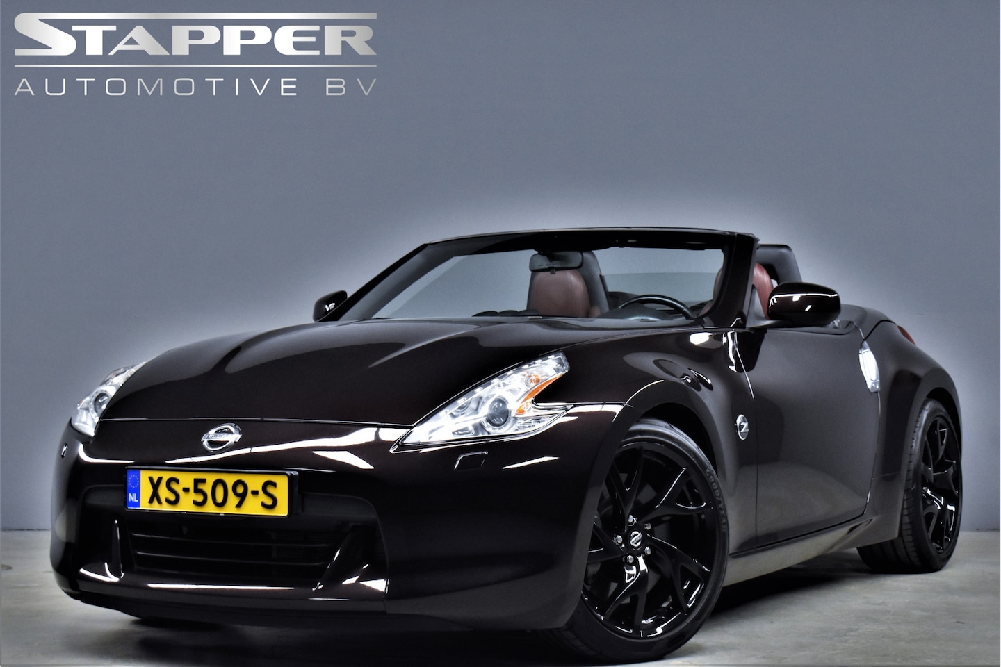 Nissan 370Z Roadster - 3.7 V6 328pk Handgeschakeld! Bose/Keyless/Navi/Xenon/H.Leer/Climate/Stoelverw./Pdc/Cruise/ - AutoWereld.nl