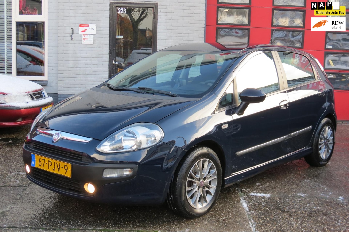 Fiat Punto Evo - 1.3 M-Jet Dynamic 1.3 M-Jet Dynamic, NAVI, CLIMA , LM VELG - AutoWereld.nl