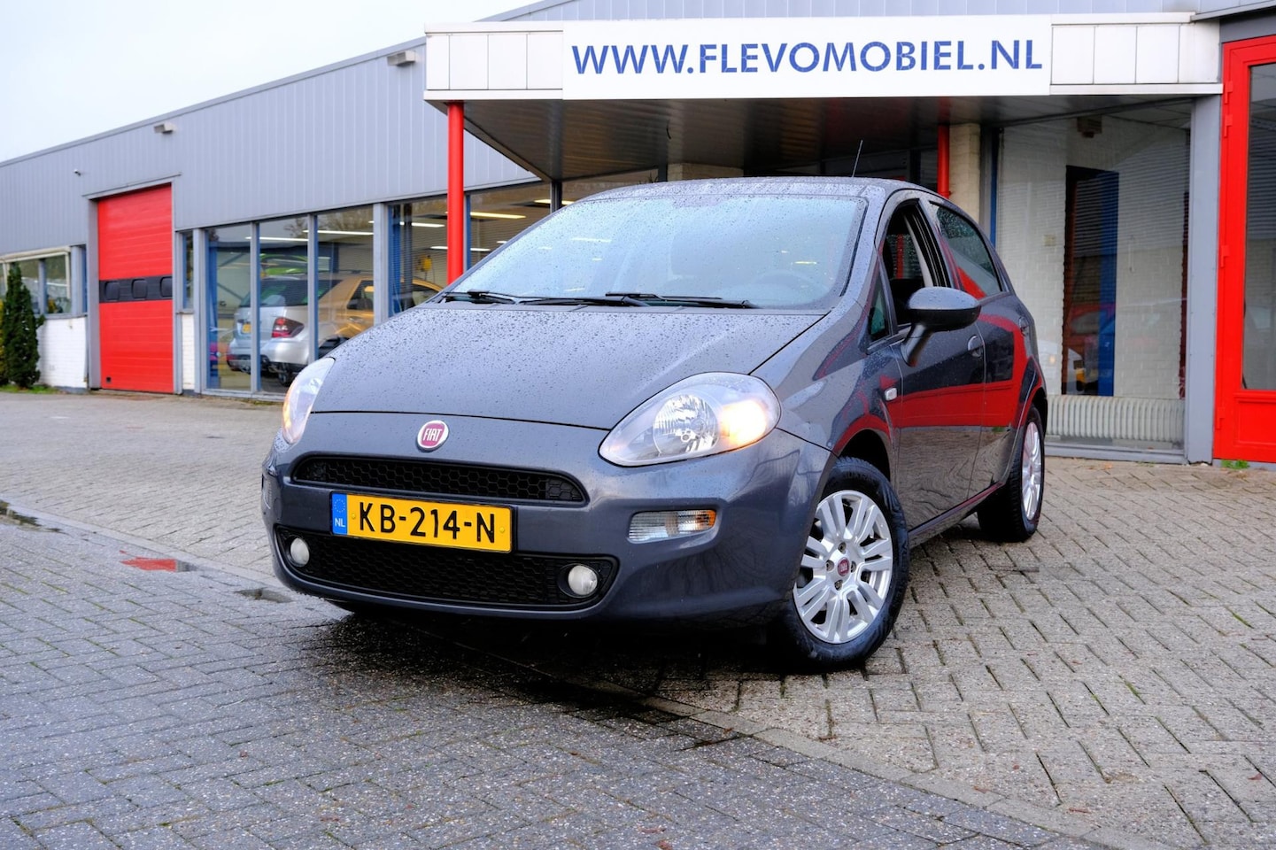 Fiat Punto Evo - 0.9 TwinAir Lounge 5-drs Airco|LMV - AutoWereld.nl