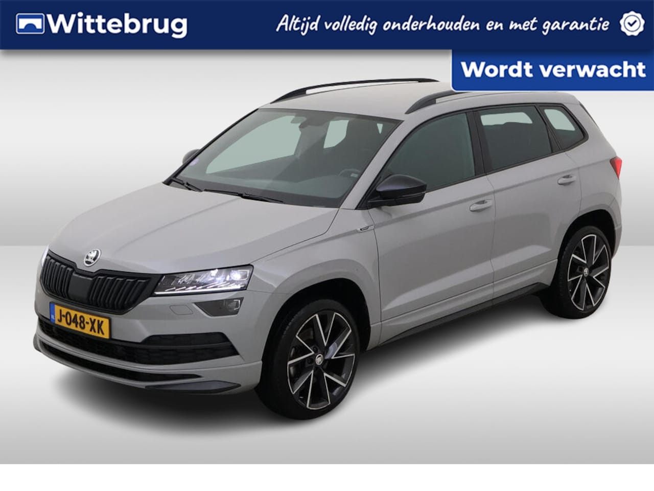 Skoda Karoq - 1.5 TSI ACT 150pk Sportline Business / NAVI / APP.Connect / CAMERA / Elektr. Trekhaak / 19 - AutoWereld.nl