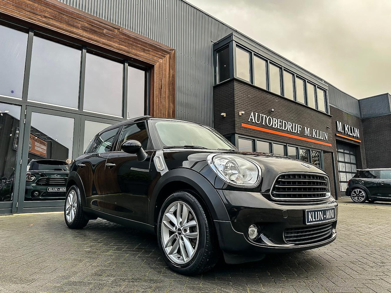 MINI Countryman - Mini 1.6 One Holland Street/navi/half leer/climate/17"S/topstaat - AutoWereld.nl