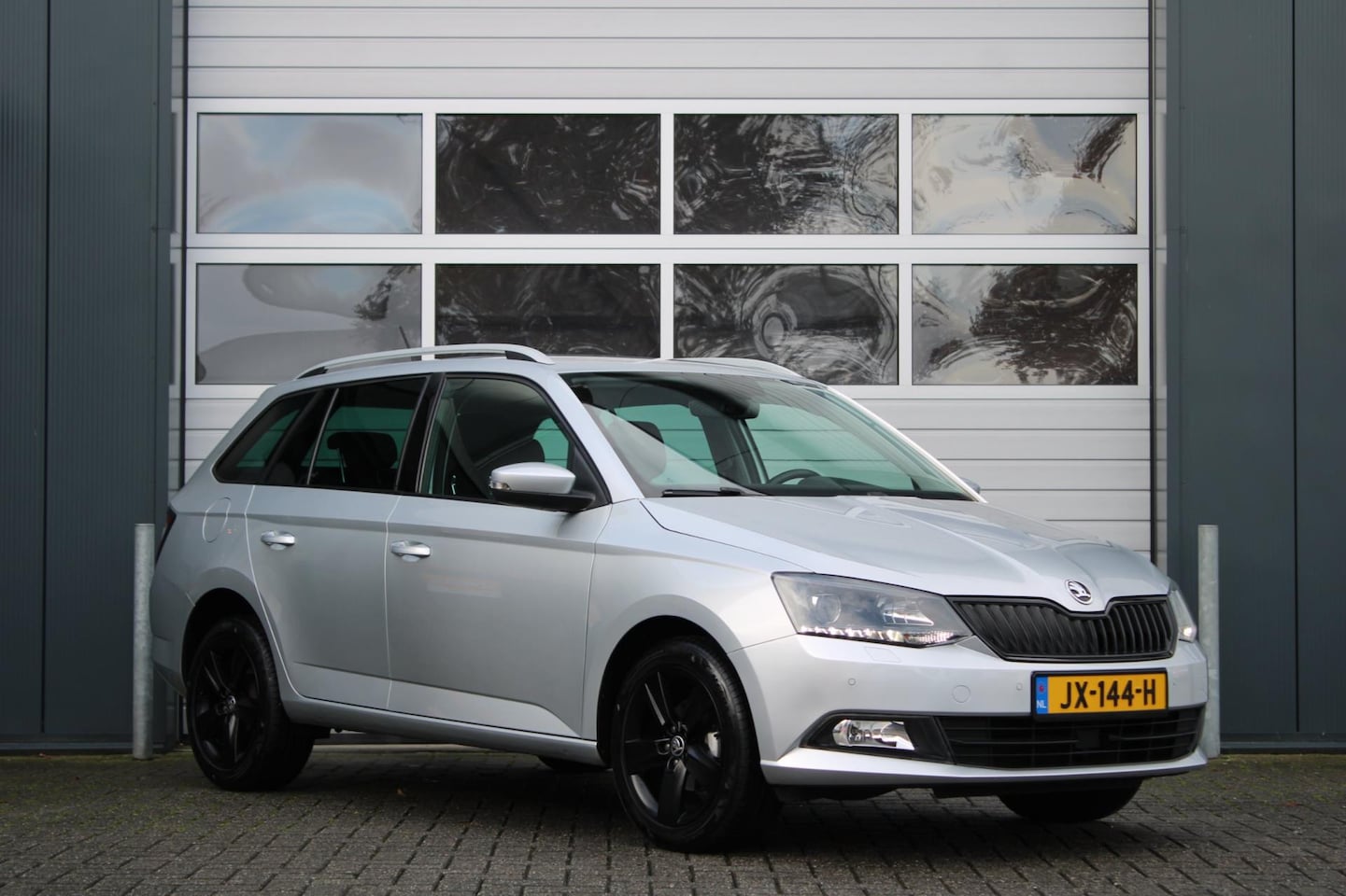 Skoda Fabia Combi - 1.2 TSI Style Business Clima/Cruise/Navi/Bluetooth/AppleCarplay/AndroidAuto/Stoelverwarmin - AutoWereld.nl