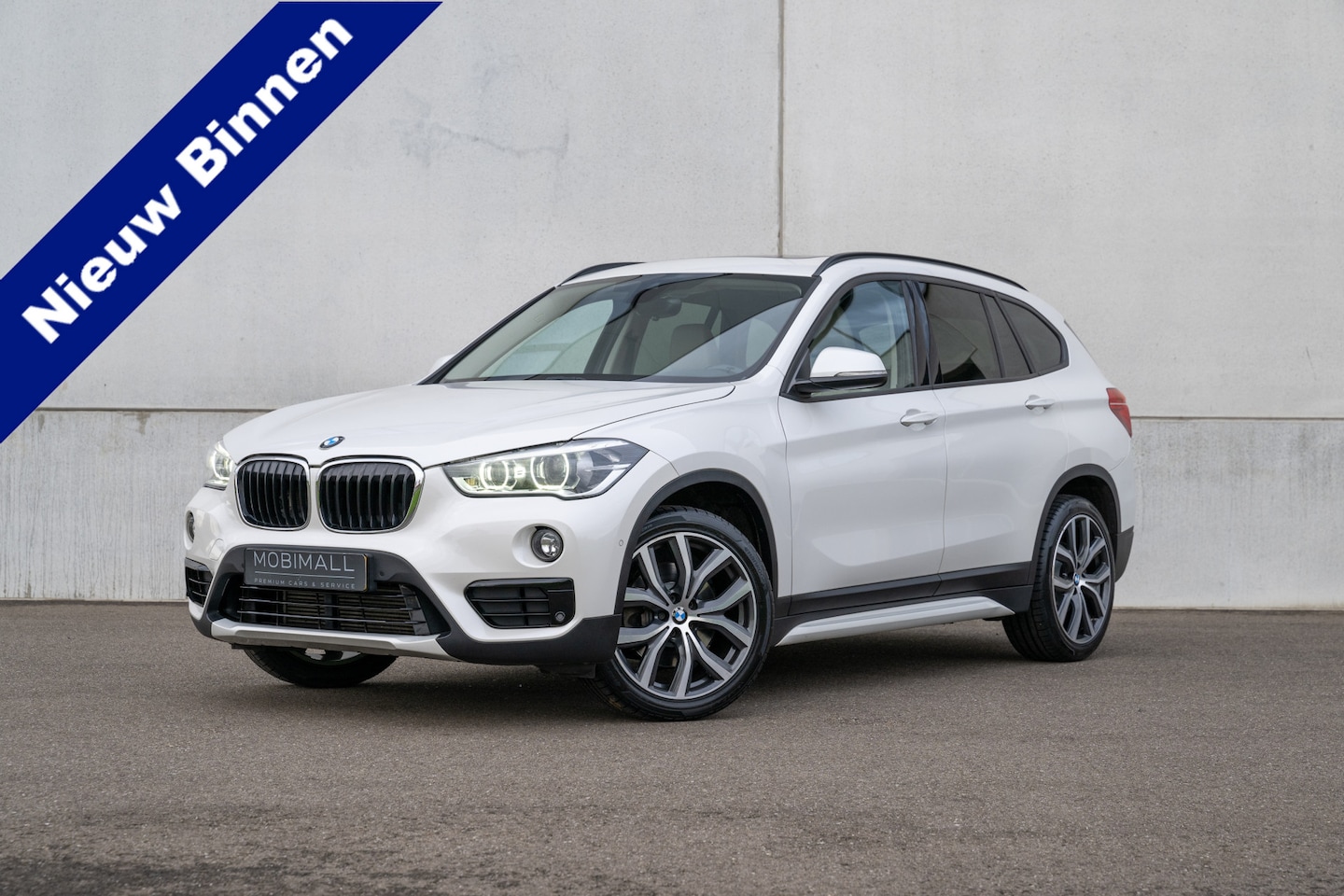 BMW X1 - xDrive25i High Executive/ Panoramadak/ Harman/Kardon - AutoWereld.nl