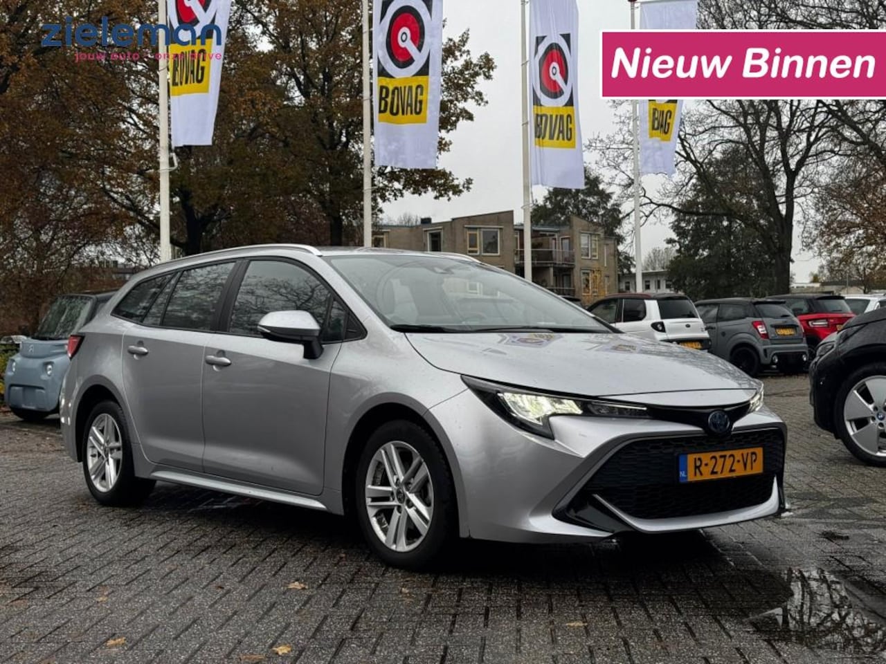 Toyota Corolla - Touring 1.8 Hybrid Active - Carplay, Camera, Clima - AutoWereld.nl