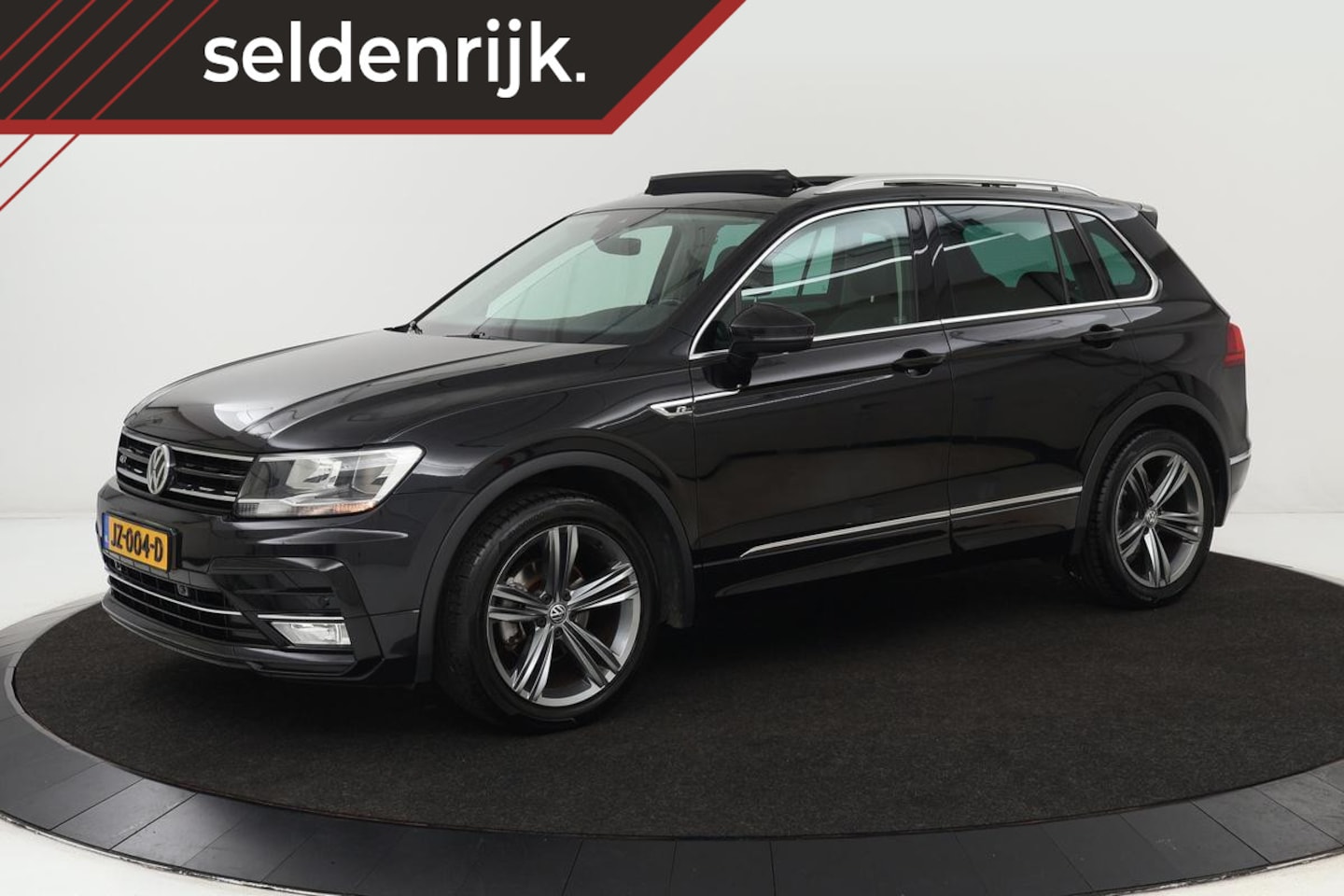 Volkswagen Tiguan - 1.4 TSI R-line | Panoramadak | Trekhaak | Stoelverwarming | Carplay | Massage | Climate co - AutoWereld.nl