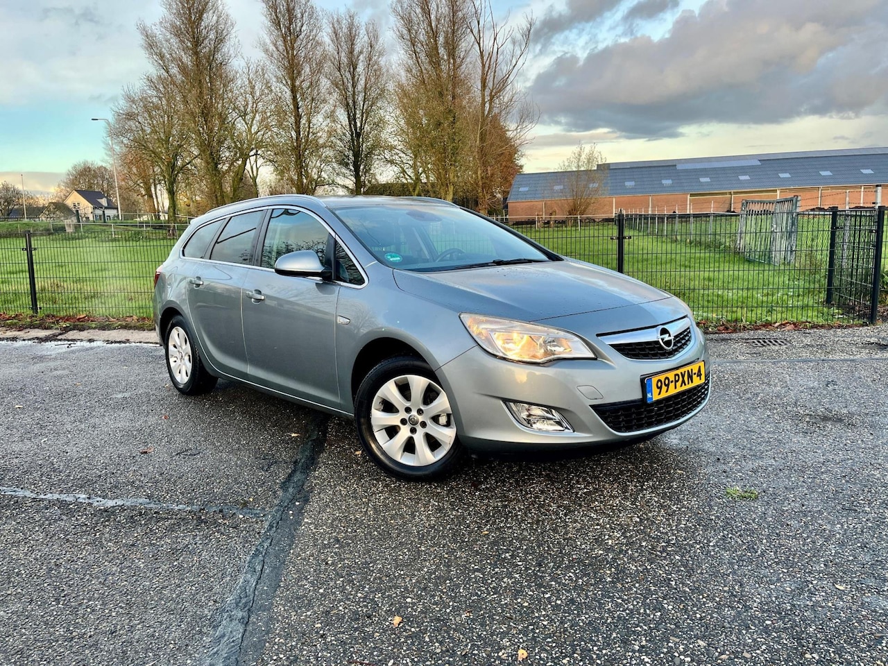 Opel Astra Sports Tourer - 1.4 Turbo Cosmo / 120pk / Automatische klimaatregeling / - AutoWereld.nl