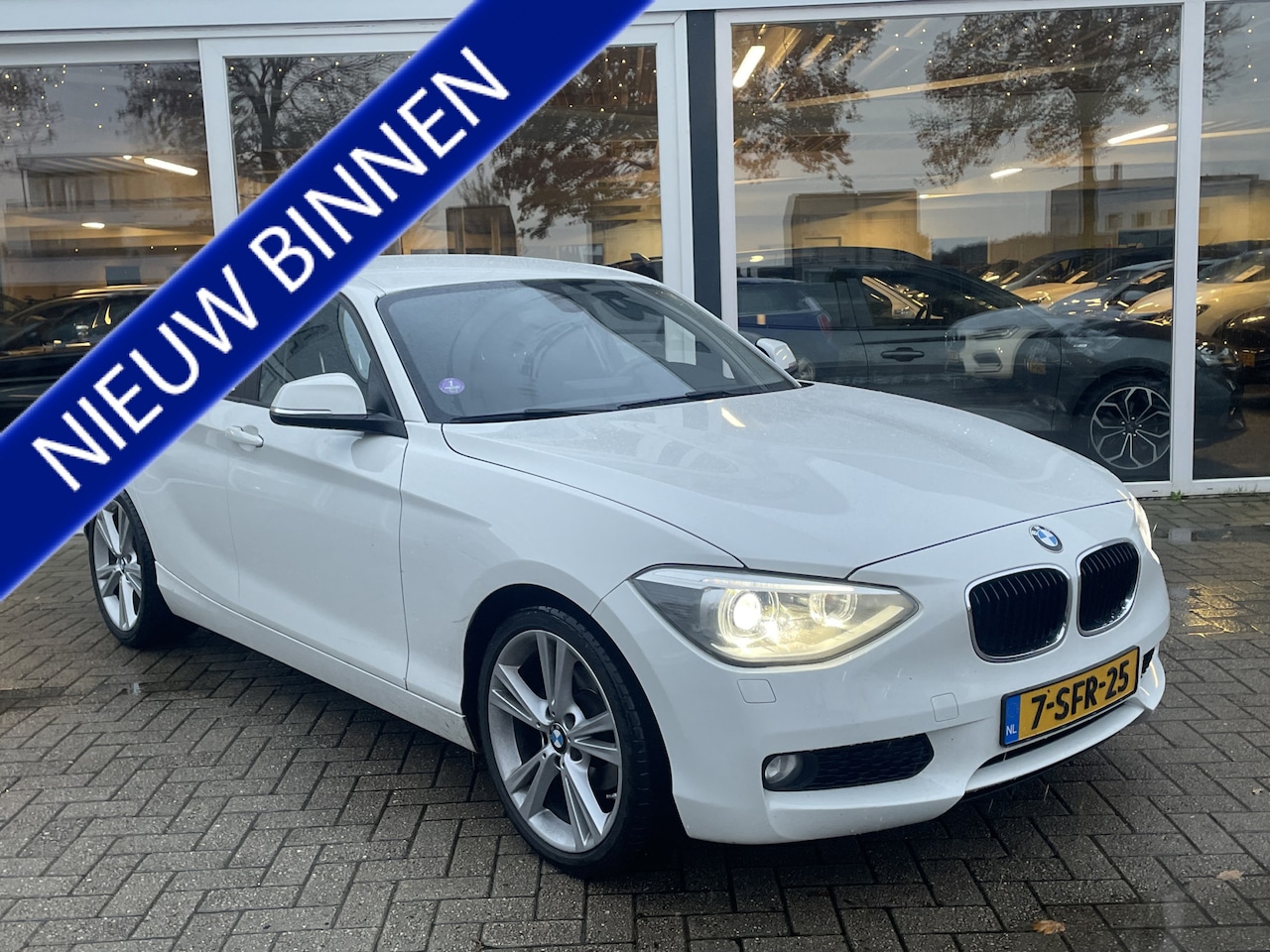 BMW 1-serie - 114i EDE Business 50% deal 4.225,- ACTIE LED / LMV / PDC achter / Cruise / Clima - AutoWereld.nl