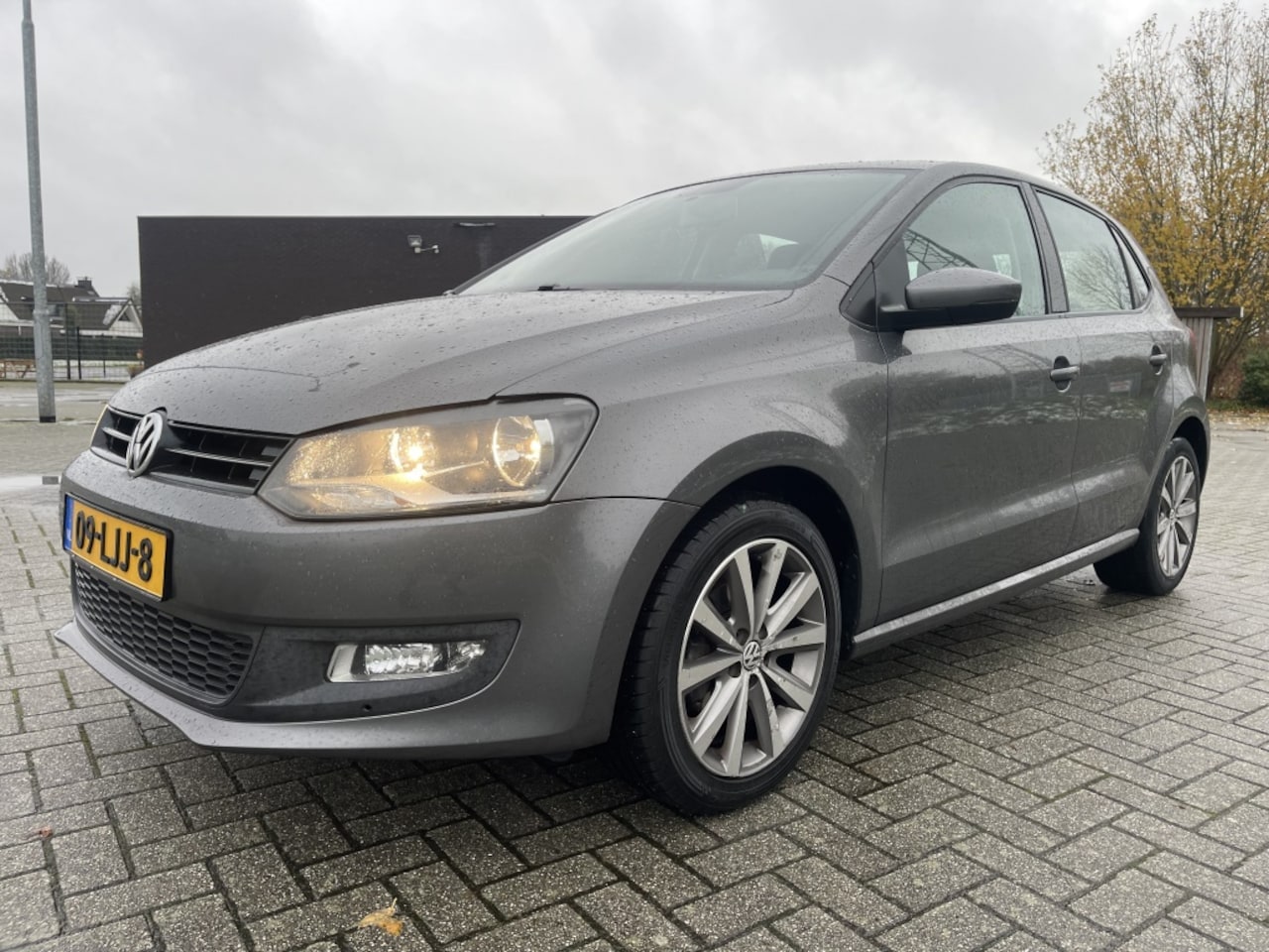 Volkswagen Polo - 1.4-16V Comfortline AIRCO-NAVI-CRUISE - AutoWereld.nl