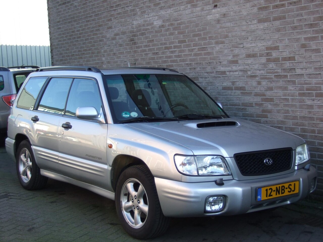 Subaru Forester - 2.0 AWD XT - Airco - Schuifdak - Stoelverwarming- - AutoWereld.nl