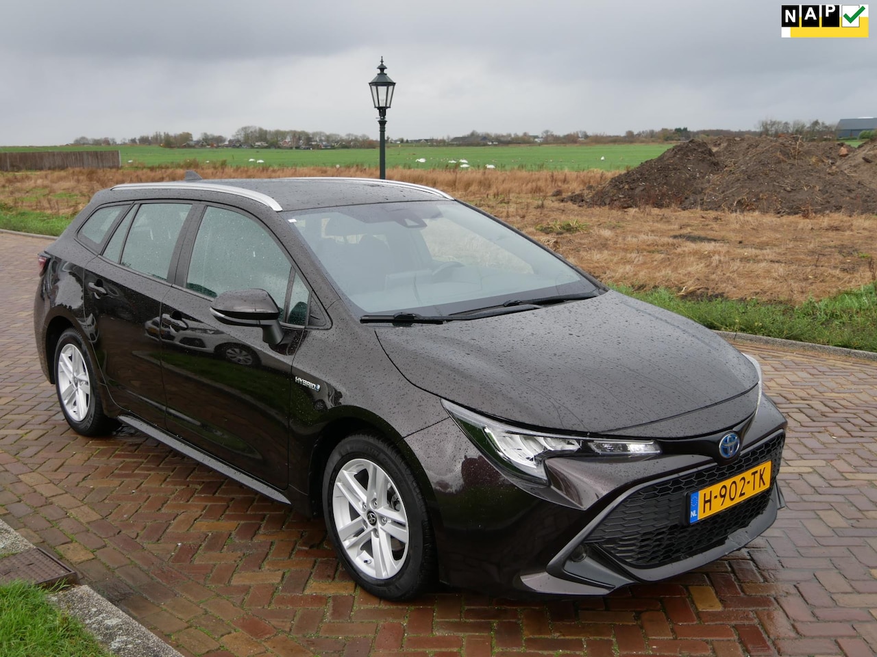 Toyota Corolla Touring Sports - 1.8 Hybrid Active ** 11999 NETTO ** - AutoWereld.nl