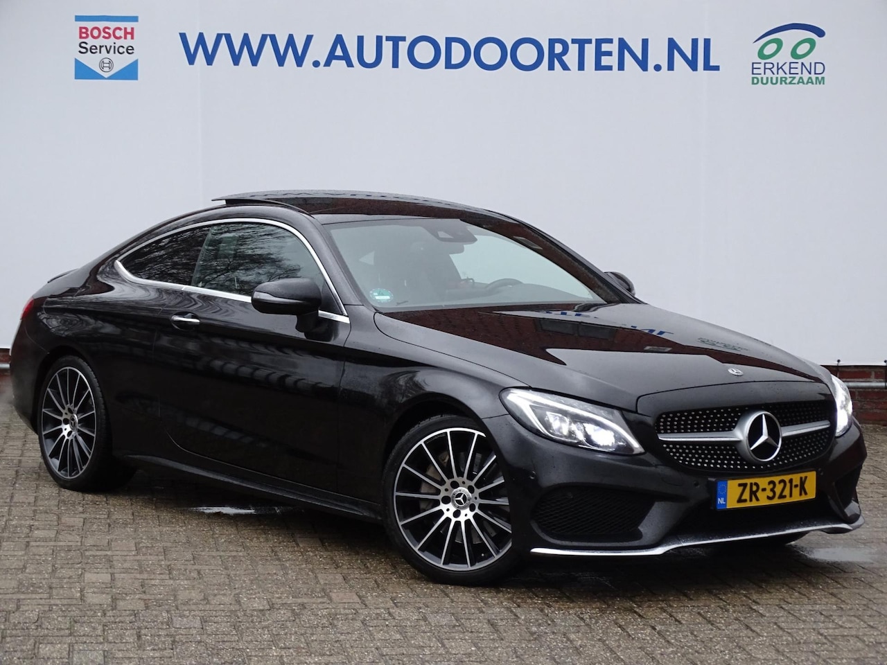 Mercedes-Benz C-klasse Coupé - 250 AMG Line Premium Plus Night|CAM|PANO|NAVI - AutoWereld.nl