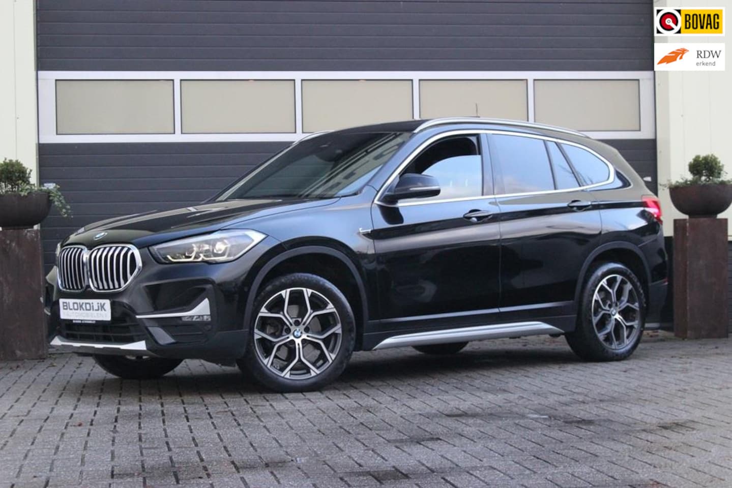 BMW X1 - 1.8i sDrive xLine | Carplay | Trekhaak | Panoramadak | - AutoWereld.nl