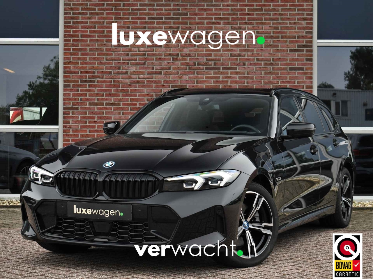 BMW 3-serie Touring - 330e M-Sport Trekh El-zetels HUD Camera Adp-onderstel - AutoWereld.nl