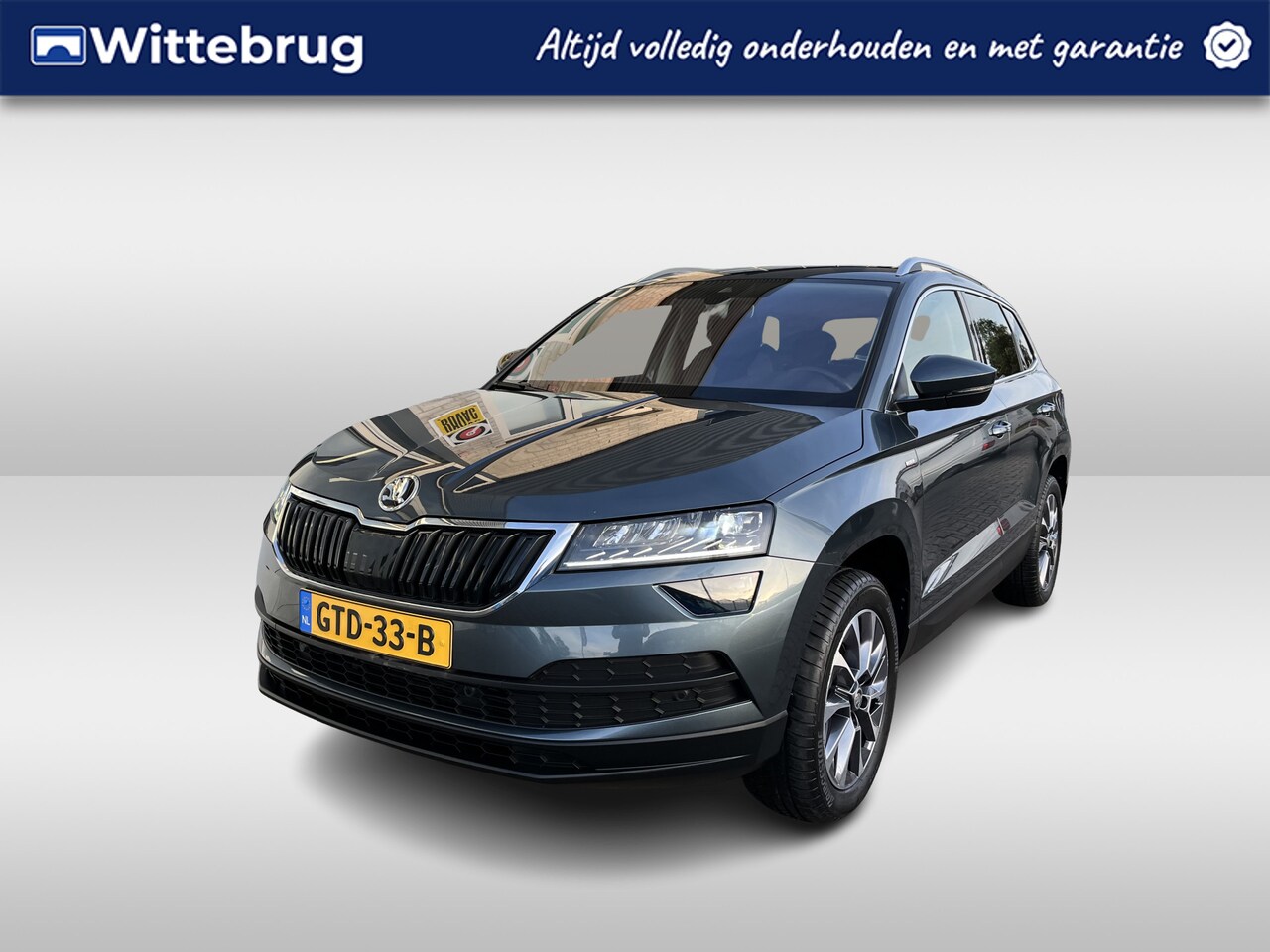 Skoda Karoq - 1.5 TSI Ambition Drive 125 / CAMERA/ PARK. SENSOREN/ LED/ CRUISE/ STOEL VERWARM. V EN A/ V - AutoWereld.nl