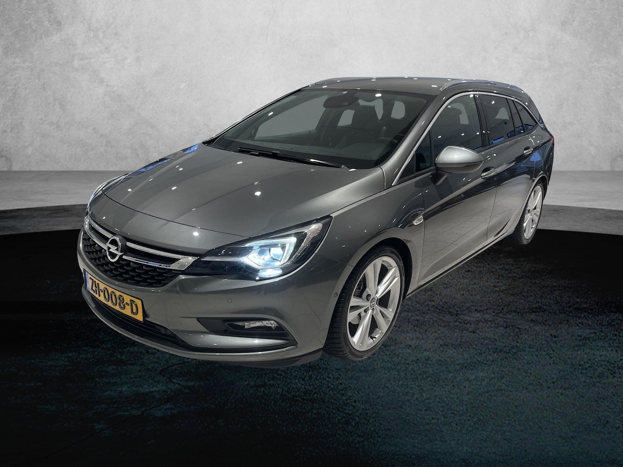 Opel Astra Sports Tourer - 150pk Turbo Innovation (2de eig./LEER/AGR/Winterpakket/18"LMV/Camera/Keyless/NL Auto!) - AutoWereld.nl