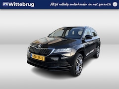 Skoda Karoq - 1.0 TSI Ambition Drive 125 / PARK. SENSOREN/ LED/ CRUISE/ STOEL VERWARM./ KEYLESS/ APP CON