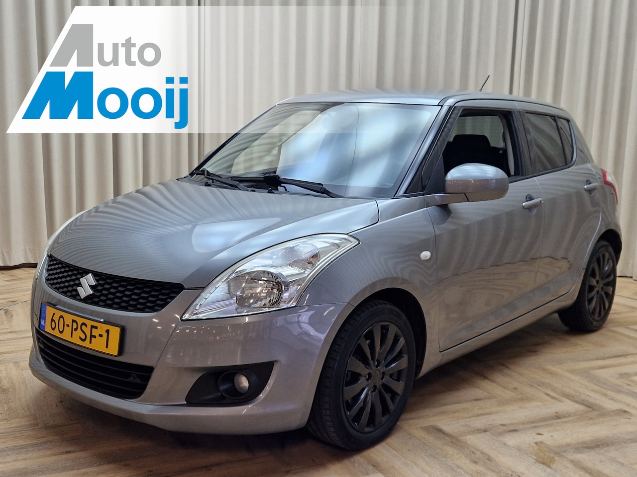 Suzuki Swift - 1.2 Exclusive EASSS *Stoelverwarming* Keyless / ECC Clima / Cruise Control / PDC / 16'' LM - AutoWereld.nl