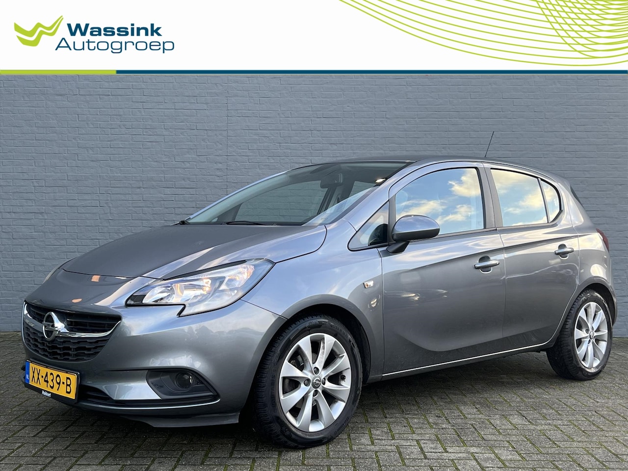 Opel Corsa - 1.4 90pk 5d Favourite | 16 inch LMV | Airco - AutoWereld.nl