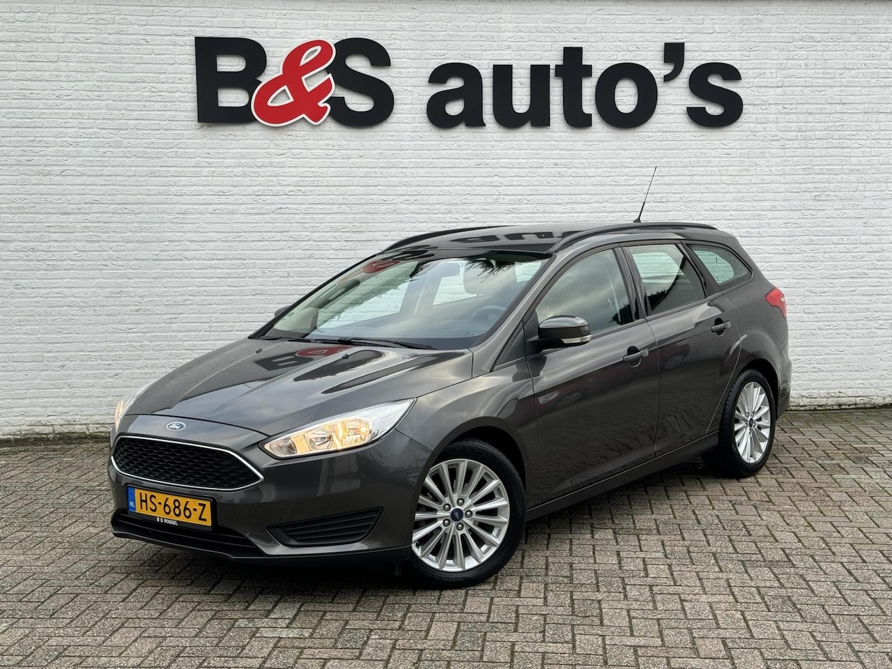 Ford Focus Wagon - 1.0 Trend Edition Cruise control Airco Bluetooth 17 inch LM velgen Navigatie - AutoWereld.nl