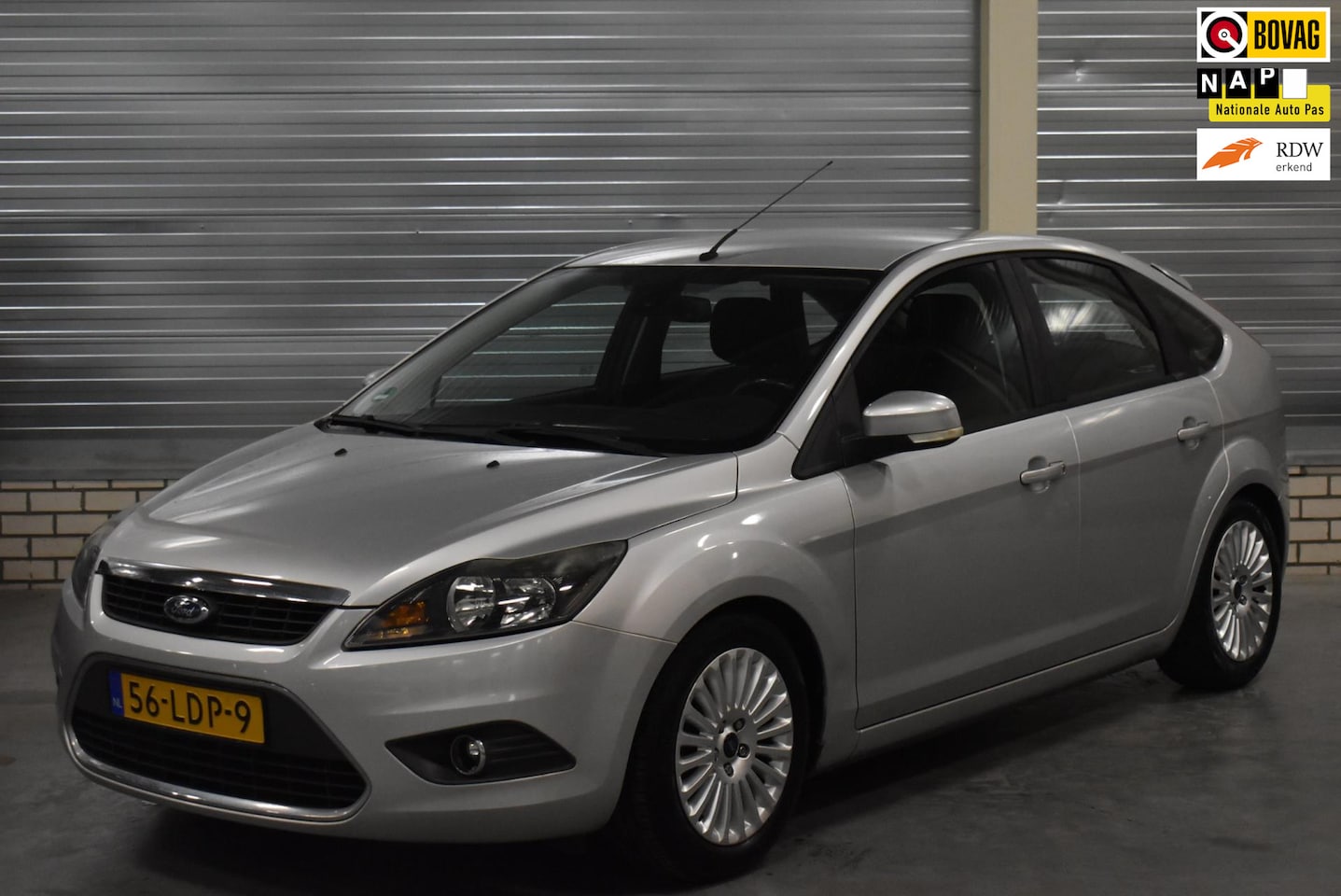 Ford Focus - 1.8 Limited + Navigatie|Bluetooth|Clima|Cruise Control|Verlaagd| - AutoWereld.nl