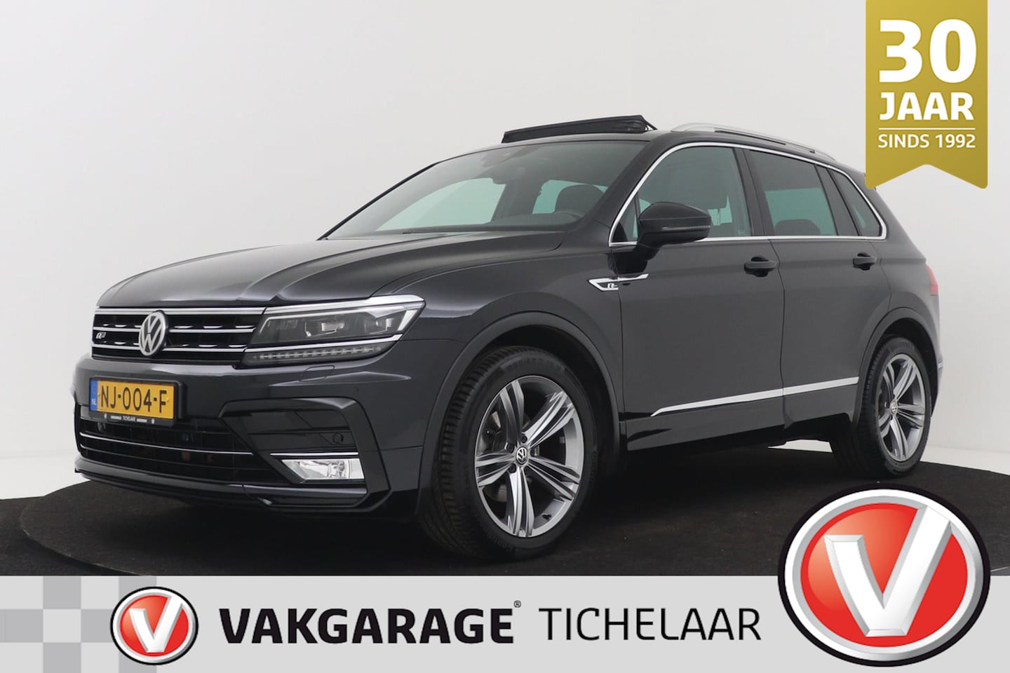 Volkswagen Tiguan - 1.4 TSI Connected Series | R-line | Panoramadak | Org NL | Adap LED | Keyless entry | Etc - AutoWereld.nl