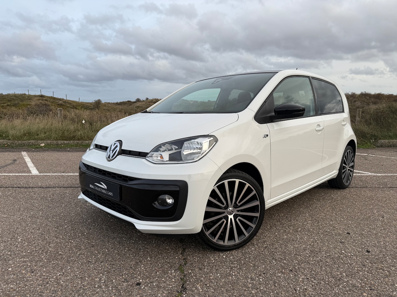 Volkswagen Up! - 1.0 BMT high up! R-line | 17" | Bluetooth | DAB | - AutoWereld.nl