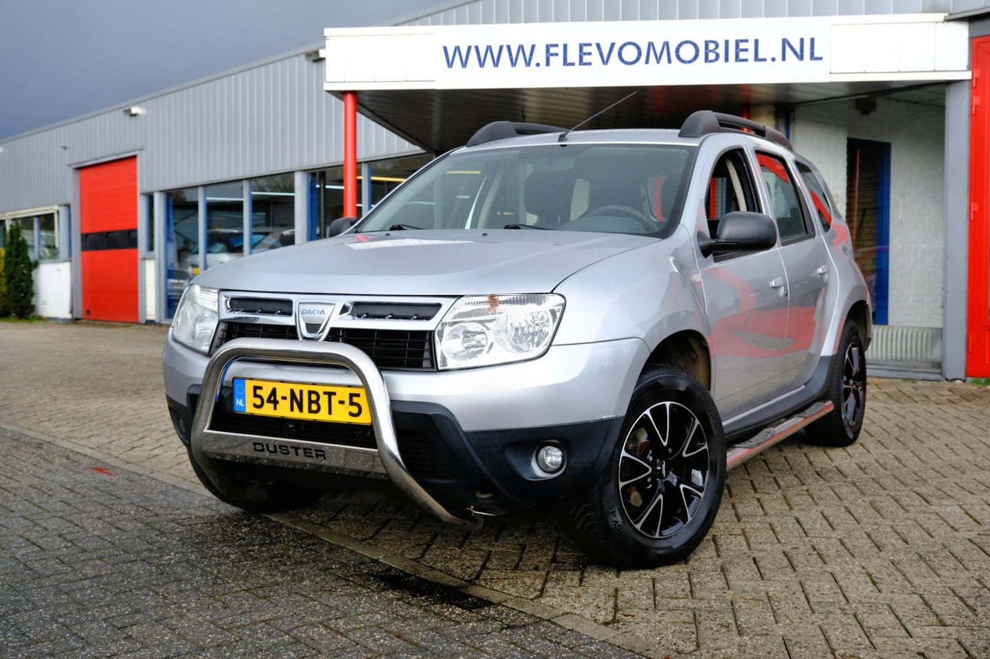 Dacia Duster - 1.6 Lauréate 2wd Airco|LMV|Trekhaak - AutoWereld.nl