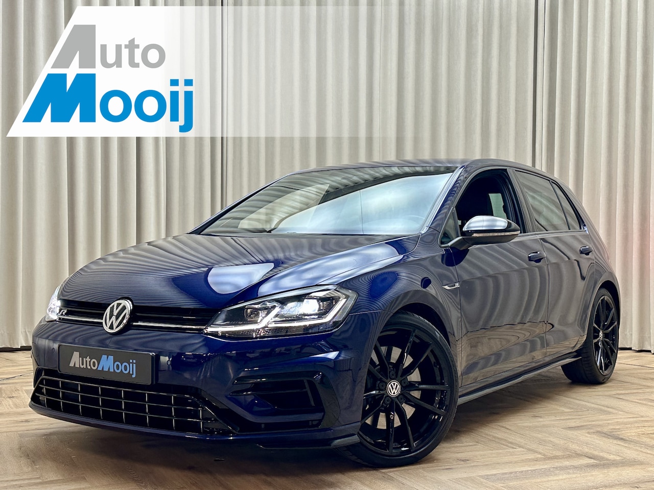 Volkswagen Golf - 2.0 R 7.5 *Atlantic Blue* 1e Eigenaar! 310PK / Leder / Dynaudio / Stoelverwarming / Digita - AutoWereld.nl