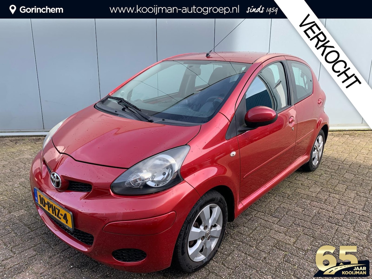 Toyota Aygo - 1.0-12V Aspiration Red Navigator | 1e Eigenaar | DLR onderhouden | Navigatie | Unieke Uitv - AutoWereld.nl