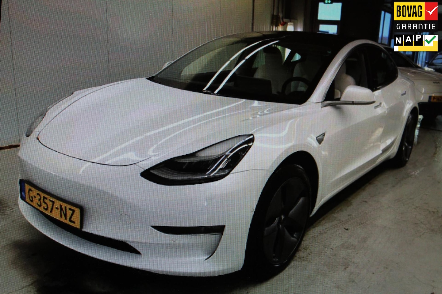 Tesla Model 3 - Long Range RWD Long Range AWD 75 kWh AUTOPILOT/ TREKHAAK / LEER / PANODAK / INCL. BTW - AutoWereld.nl