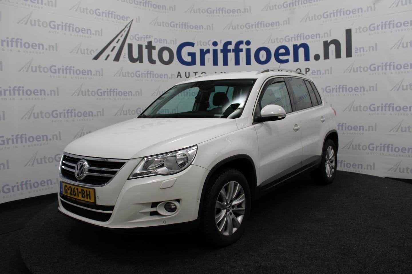 Volkswagen Tiguan - 1.4 TSI Comfort&Design 4Motion nette SUV met trekhaak - AutoWereld.nl