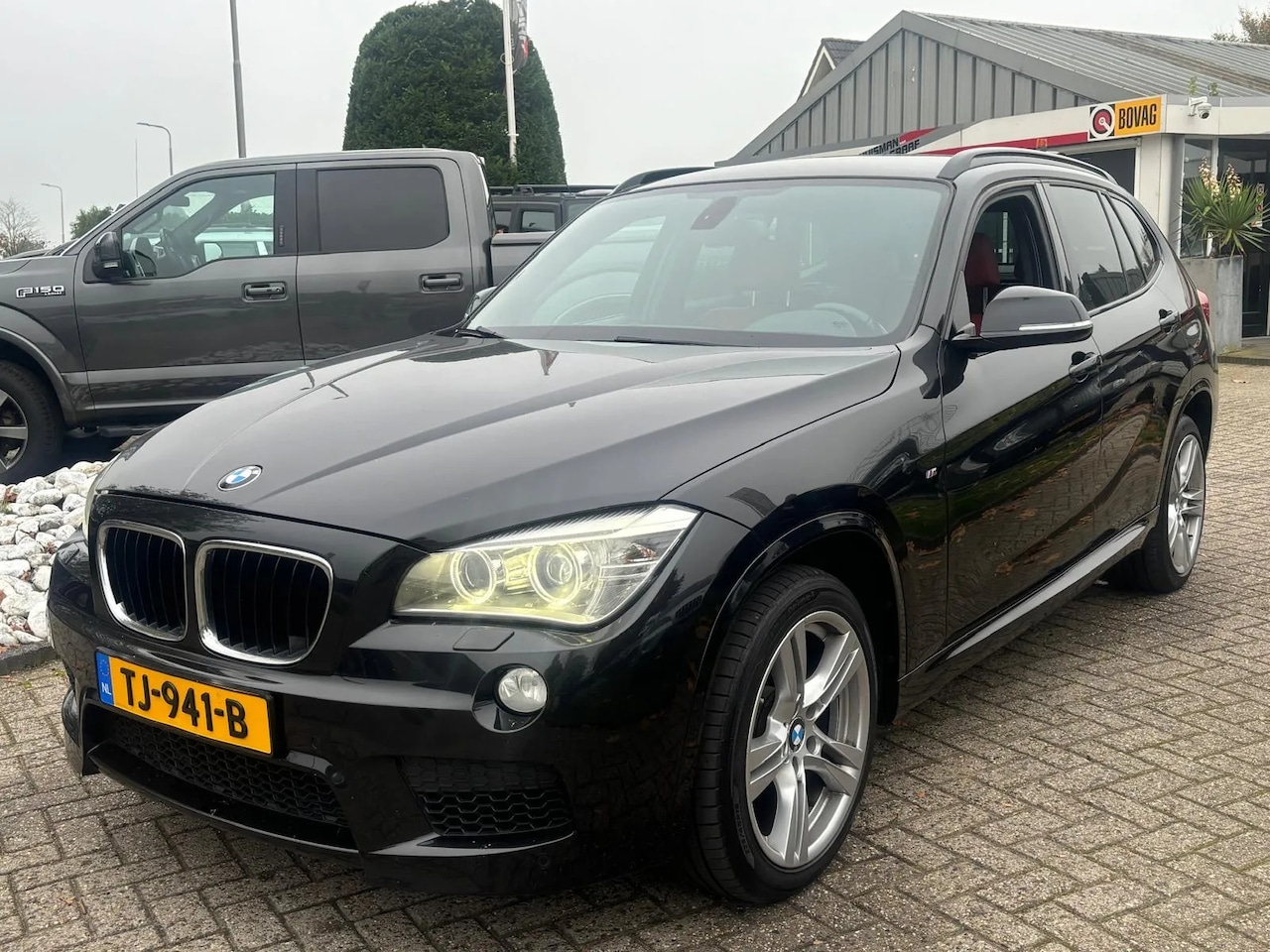 BMW X1 - X-Drive 2.0D 2015 High Exe M-Pakket Rood Leer - AutoWereld.nl