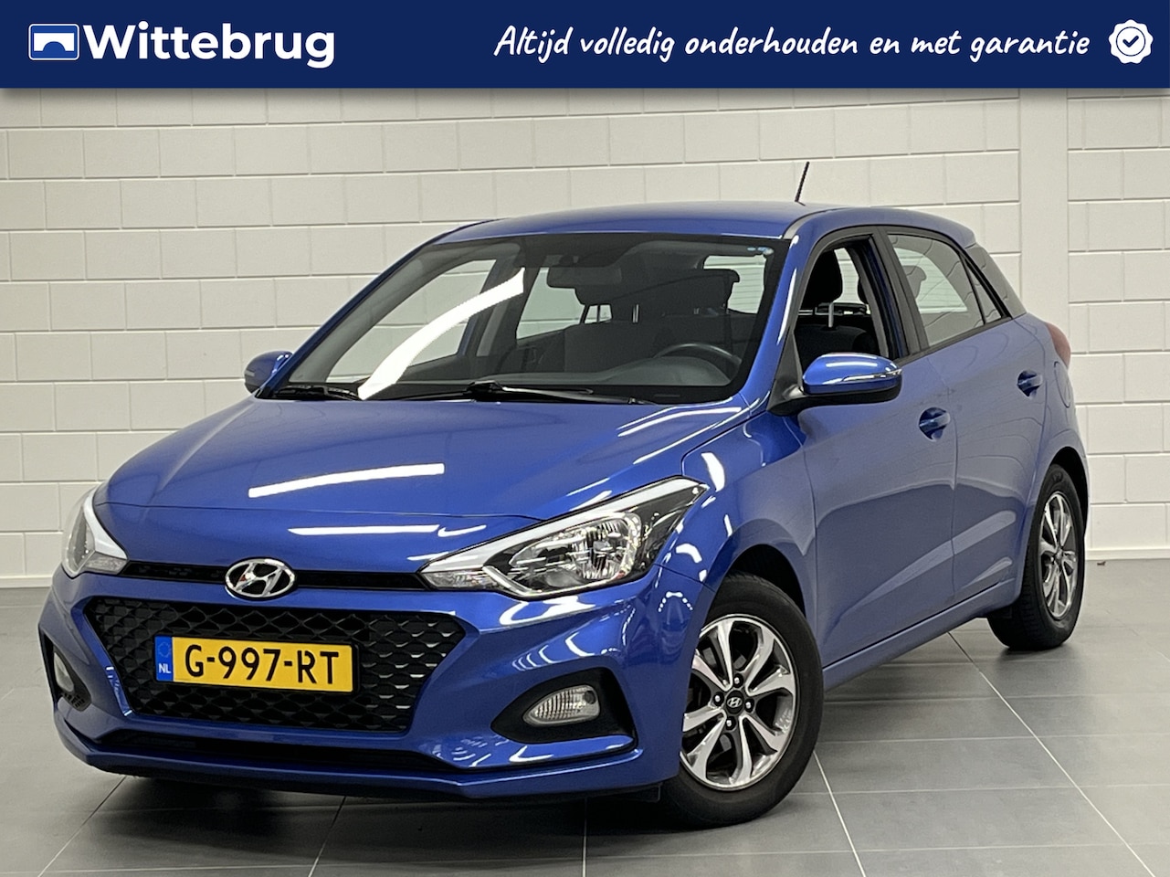 Hyundai i20 - 1.2 MPi i-Motion TREKHAAK | NAVIGATIE | PARKEERCAMERA | AIRCO | LICHTMETALEN VELGEN | LEUK - AutoWereld.nl