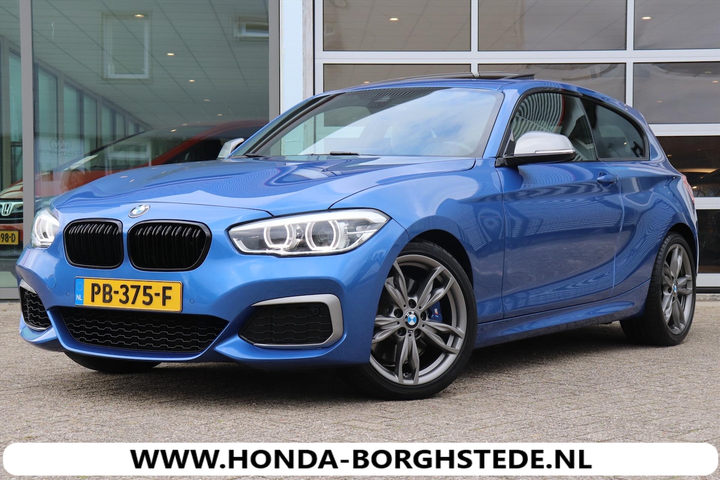 BMW 1-serie - (f20) M140i 340pk .Aut .M. High Executive - AutoWereld.nl