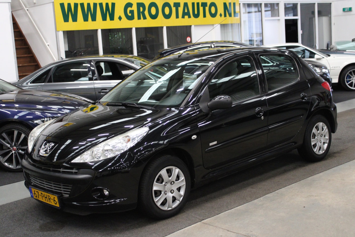 Peugeot 206 - 1.4 Millesim 200 Airco, Stuurbekrachtiging - AutoWereld.nl