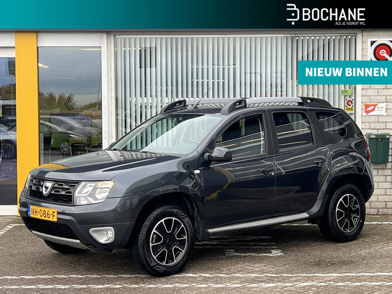 Dacia Duster - 1.2 TCe 4x2 Blackshadow | Trekhaak | Navigatie | Achteruitrijcamera | Airco | Cruise Contr - AutoWereld.nl