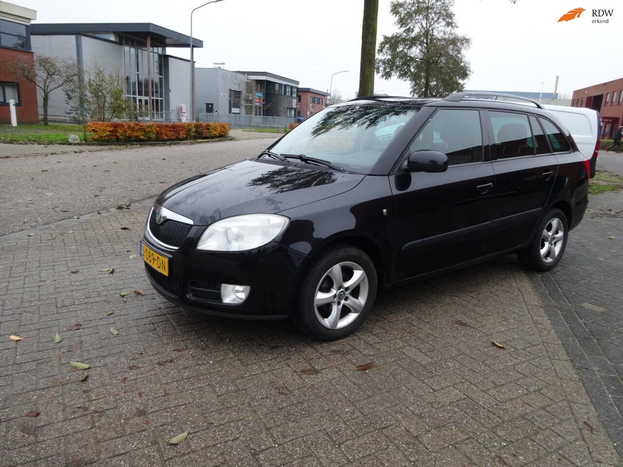 Skoda Fabia Combi - 1.4-16V Elegance/Airco/Navi/Cruise Control/Boekjes - AutoWereld.nl