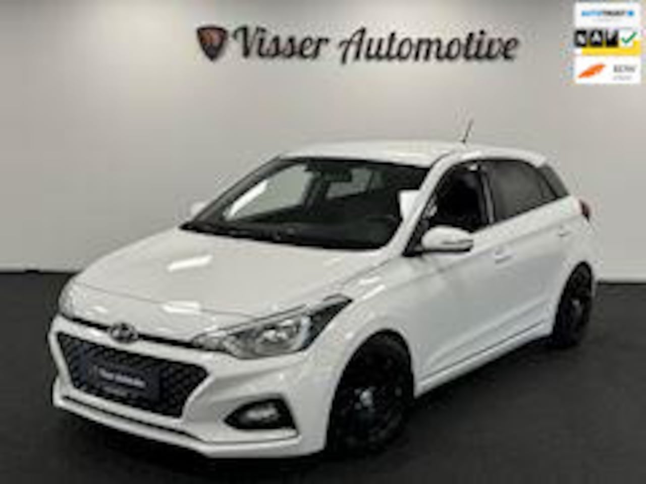 Hyundai i20 - 1.2 HP i-Motion Premium*Airco*Sport Edition*Navi* - AutoWereld.nl