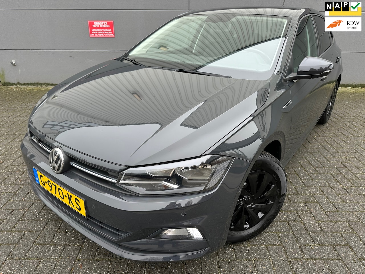 Volkswagen Polo - 1.0 TSI Comfortline Business R-LINE*CRUISE*PARK SENSOREN*NAVI*CARPLY*APK*NEW NAP*1 EIGNAAR - AutoWereld.nl